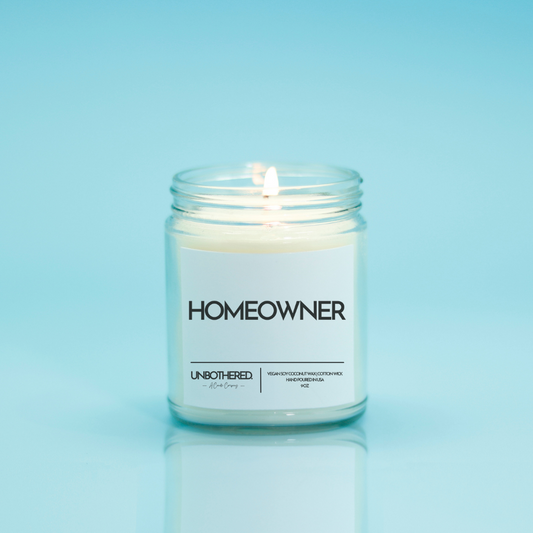 Homeowner Candle from the Unbothered Candle Co. Available in two Limited Edition Scents Pine Tree*, Holly Berry*, and two signature scents Cinnamon Roll and Vanilla Cookie. Vegan Soy Coconut Wax, 100% Cotton Wick, Hand-poured in the USA, Eco-friendly, non-toxic, no lead, no parabens, no synthetic dyes, no phthalates, and NEVER tested on animals.