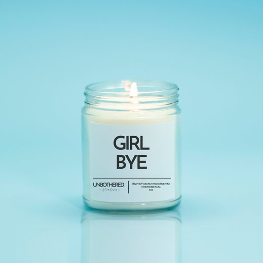 Girl Bye Candle from the Unbothered Candle Co. Available in two Limited Edition Scents Pine Tree*, Holly Berry*, and two signature scents Cinnamon Roll and Vanilla Cookie. Vegan Soy Coconut Wax, 100% Cotton Wick, Hand-poured in the USA, Eco-friendly, non-toxic, no lead, no parabens, no synthetic dyes, no phthalates, and NEVER tested on animals.